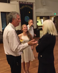 Freshly-elected Board President Mark Cameron and Secretary Katie Dix chat with Lisa Schroeder at the reception. 