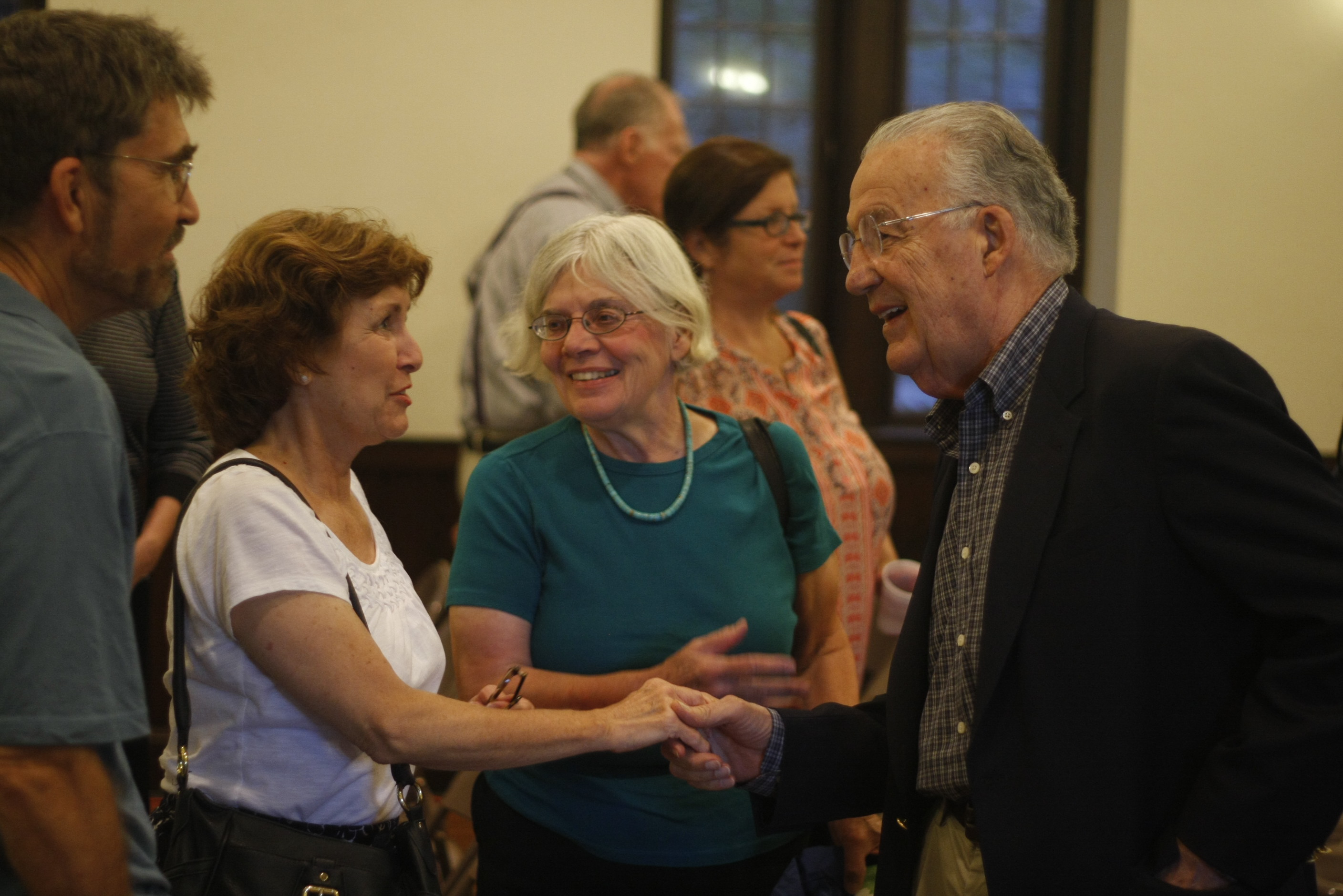 Lively discussions at the Annual Meeting reception.